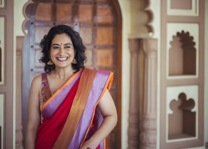 business woman happy after taking loan with the help of moneyview review